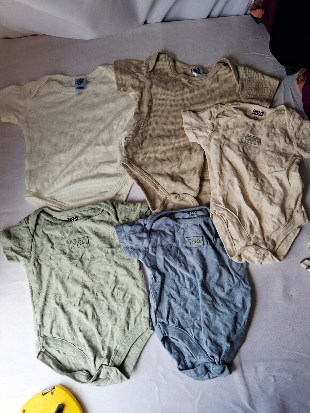 DKNY Baby Bodysuit Set in Cream, Tan, Light Green, Light Blue